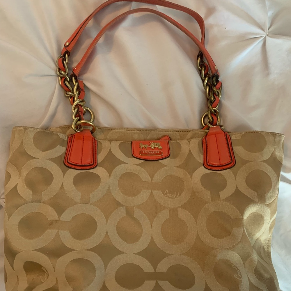 Coach purse gold and coral